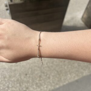 Bracelet Croix en Corde de guitare sur cordon couleur or lux SING A SONG