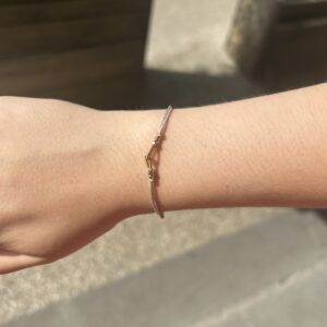 Bracelet  en Corde de guitare sur cordon couleur or lux SING A SONG