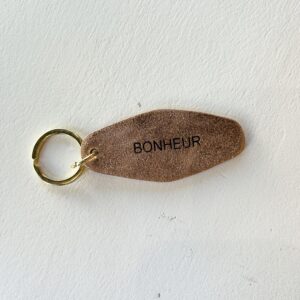 Porte clés doré bonheur Les Cleias