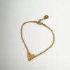 Bracelet en perles dorées pendentif cœur LES CLEIAS